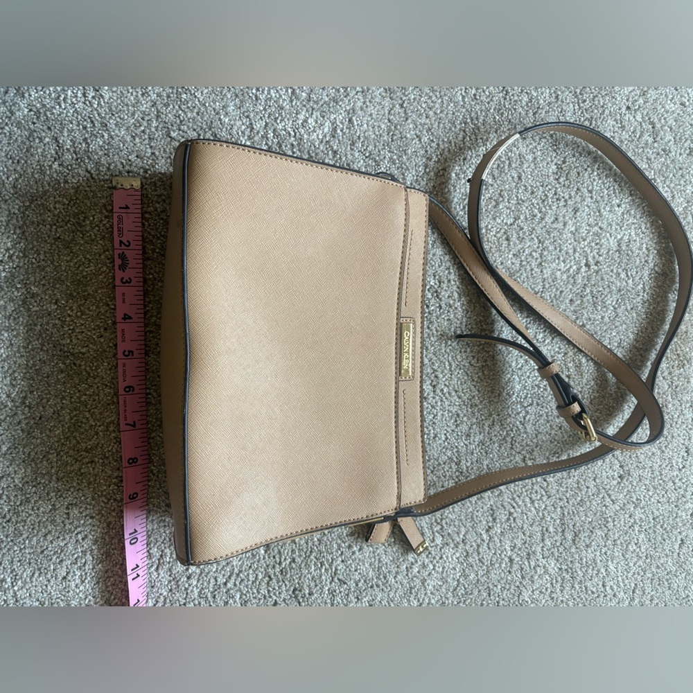 Calvin Klein cross body with only small worn/ damage to strap